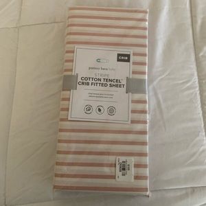 Pottery Barn baby pink “Stripe” fitted sheet